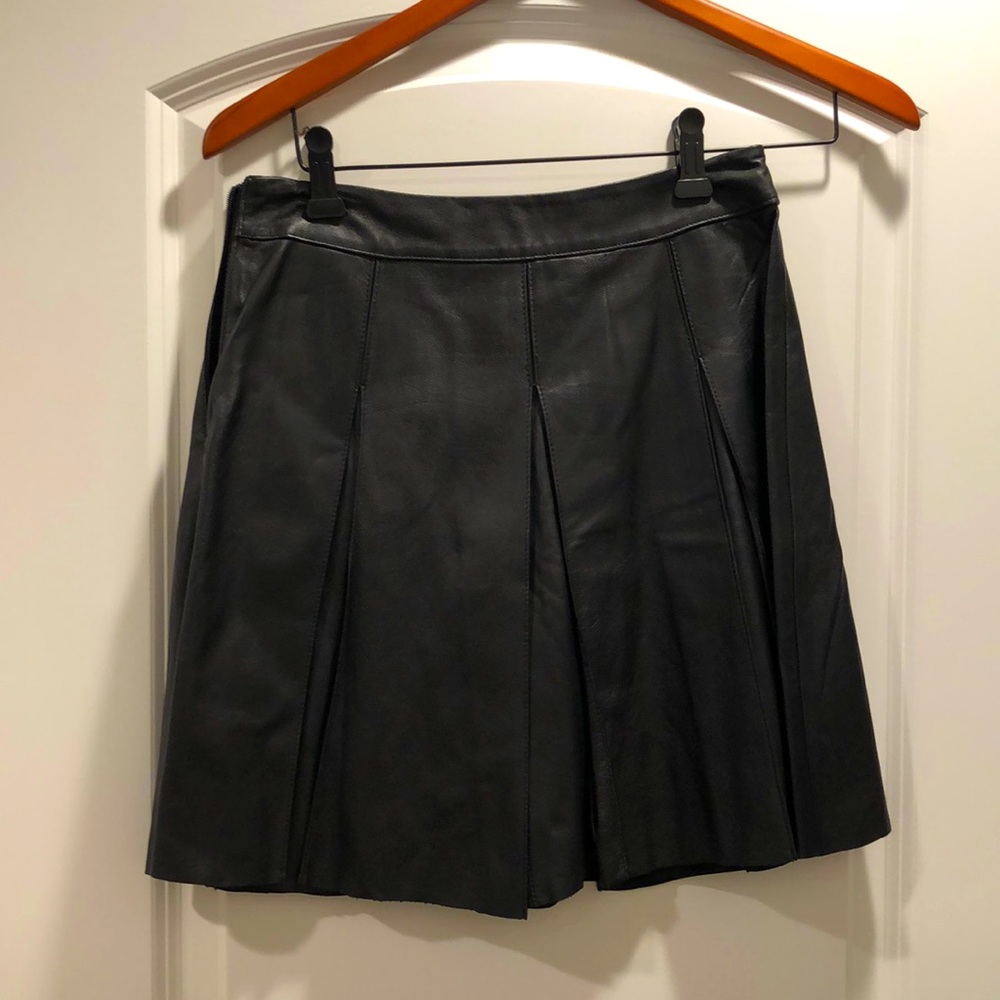 Pleated leather skirt adorable with tall boots